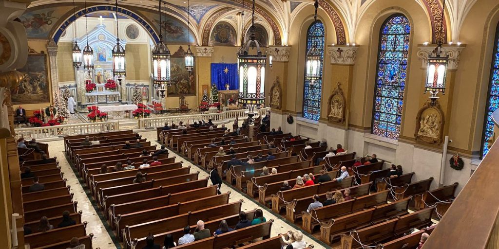 Christmas Eve Masses Parishioners Practice Social Distancing